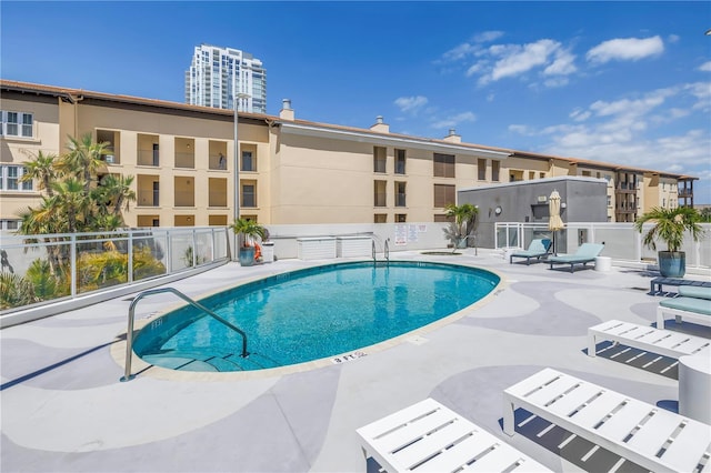 199 Dali Blvd Unit 902, Saint Petersburg, FL 33701 - community pool with fence and a patio area