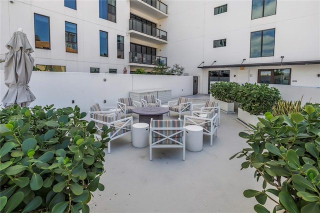 199 Dali Blvd Unit 902, Saint Petersburg, FL 33701 - view of patio with a fire pit