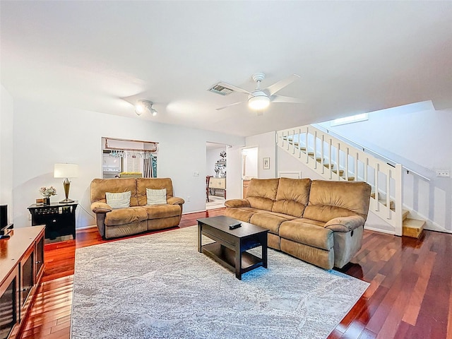3078 Pointer Dr, Palm Harbor, FL 34683 - living area featuring stairs, a ceiling fan, visible vents, and hardwood / wood-style floors