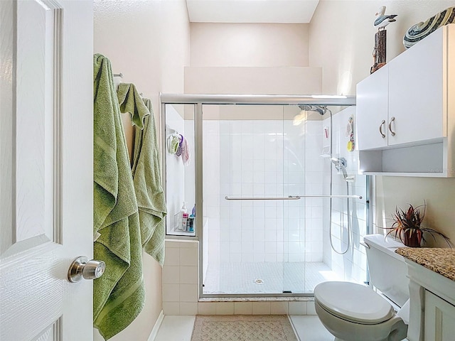 3078 Pointer Dr, Palm Harbor, FL 34683 - full bathroom with tile patterned floors, toilet, and a shower stall