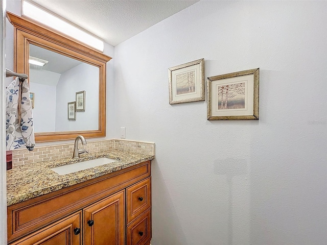 3078 Pointer Dr, Palm Harbor, FL 34683 - bathroom featuring vanity and decorative backsplash