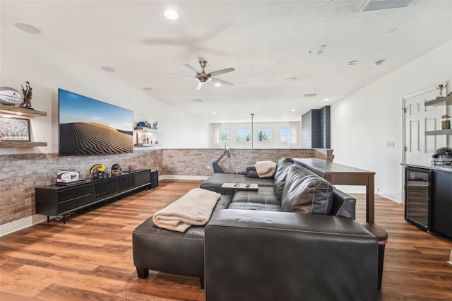 living room featuring visible vents, wood finished floors, beverage cooler, ceiling fan, and recessed lighting