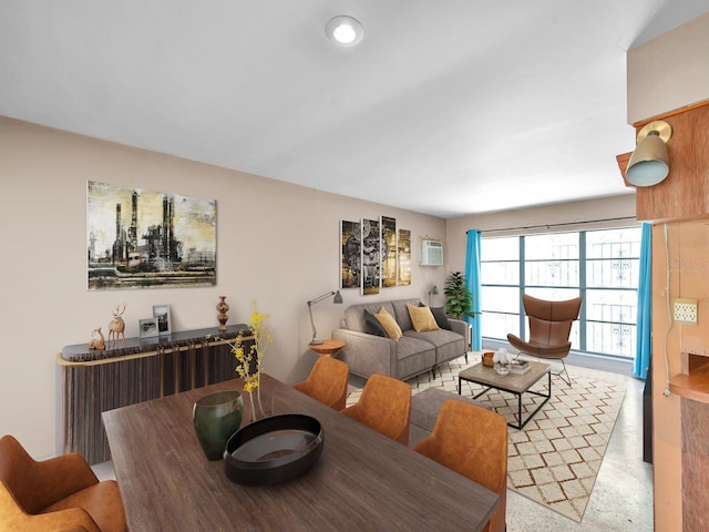 living area featuring a wall unit AC