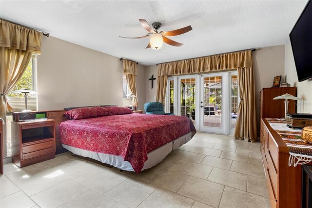 6407 E 112th Ave, Temple Terrace, FL 33617 - bedroom with french doors, access to outside, light tile patterned flooring, and ceiling fan