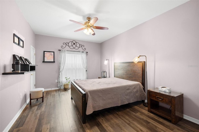 bedroom with baseboards, dark wood-style flooring, and ceiling fan
