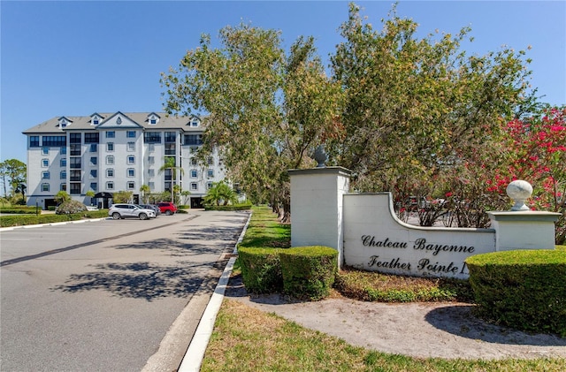 14820 Rue De Bayonne Unit 208, Clearwater, FL 33762 - community sign with uncovered parking