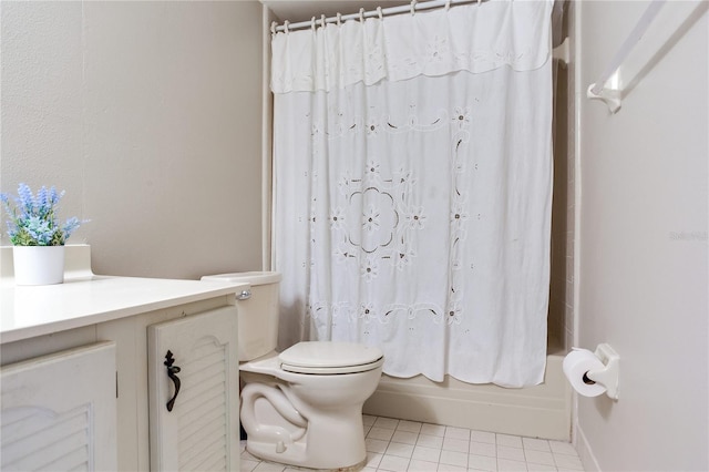 14820 Rue De Bayonne Unit 208, Clearwater, FL 33762 - full bath with toilet, tile patterned floors, shower / tub combo with curtain, and vanity