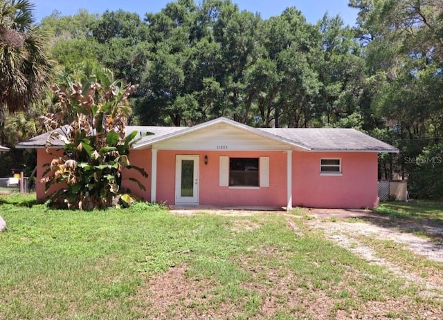 11305 SW 186th Cir, Dunnellon, FL 34432 - ranch-style house with a front lawn and stucco siding