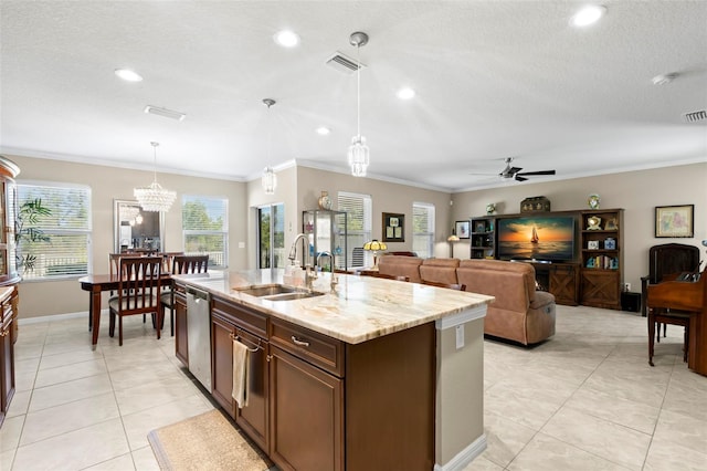 kitchen with visible vents, a sink, ceiling fan with notable chandelier, and ornamental molding