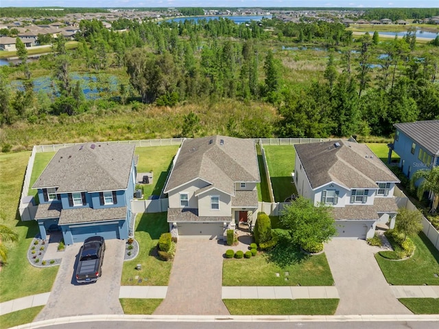 bird's eye view with a water view and a residential view