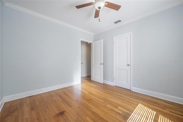 1211 E Park Cir, Tampa, FL 33604 - unfurnished room featuring ceiling fan, crown molding, light wood finished floors, and baseboards