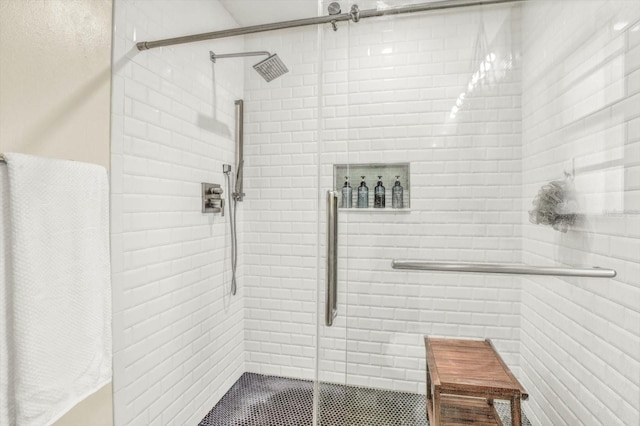 full bathroom featuring a stall shower