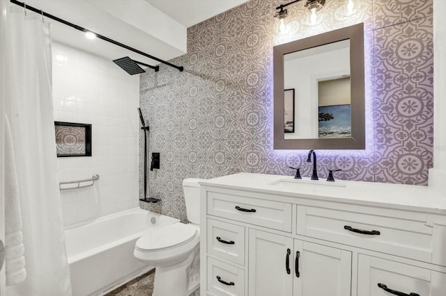 bathroom featuring vanity, shower / tub combo with curtain, toilet, and wallpapered walls