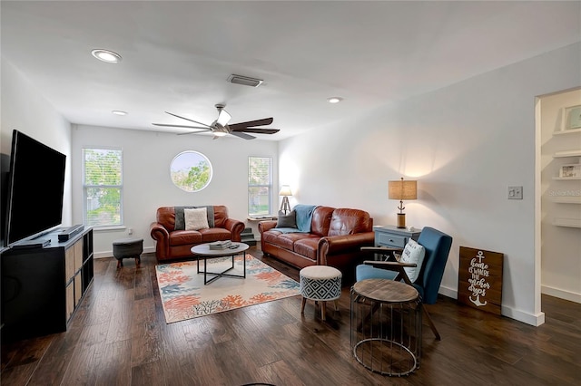 13974 75th Ave, Seminole, FL 33776 - living room with plenty of natural light, a ceiling fan, dark wood-style floors, recessed lighting, and baseboards