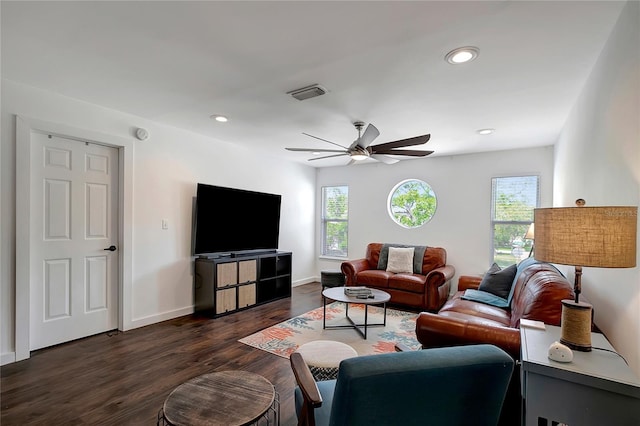 13974 75th Ave, Seminole, FL 33776 - living room featuring plenty of natural light, a ceiling fan, dark wood-type flooring, baseboards, and recessed lighting