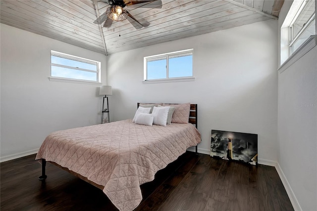 13974 75th Ave, Seminole, FL 33776 - bedroom with multiple windows, wood ceiling, wood finished floors, and baseboards