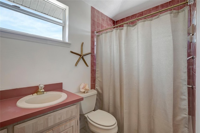13974 75th Ave, Seminole, FL 33776 - full bathroom featuring toilet, vanity, and a shower with curtain