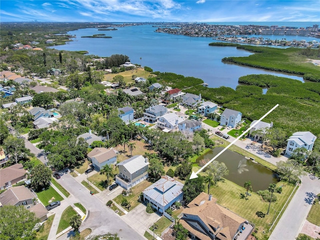 13974 75th Ave, Seminole, FL 33776 - aerial view of property and surrounding area featuring a large body of water and nearby suburban area