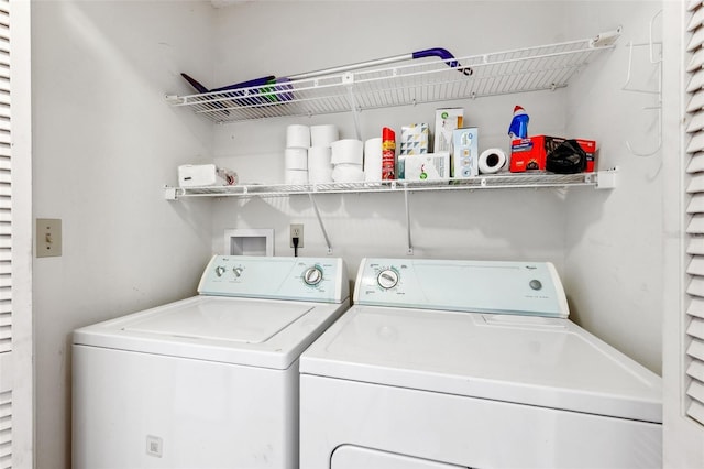 laundry room with washer and dryer