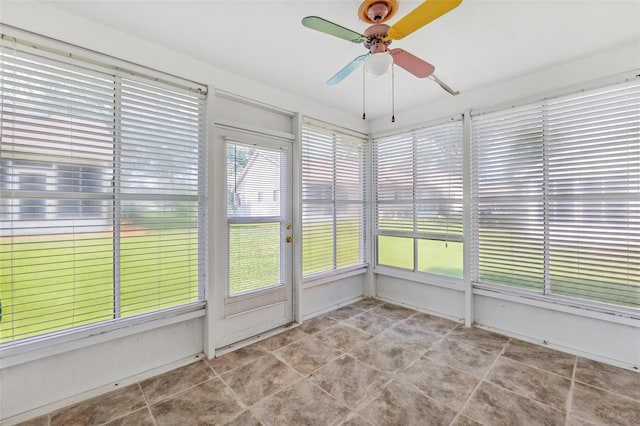 unfurnished sunroom with tile patterned floors