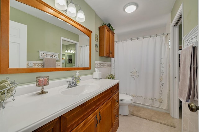 2153 Catalina Dr N, Clearwater, FL 33763 - full bath with vanity, tile patterned flooring, toilet, and a shower with shower curtain