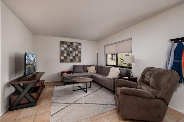 11708 Raintree Village Blvd Unit A, Temple Terrace, FL 33617 - living area featuring baseboards and light tile patterned floors