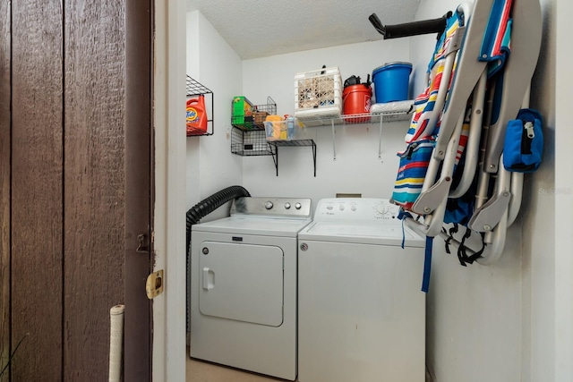 11708 Raintree Village Blvd Unit A, Temple Terrace, FL 33617 - washroom with independent washer and dryer, a textured ceiling, and laundry area