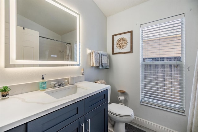 18013 Palm Breeze Dr, Tampa, FL 33647 - full bath with vanity, baseboards, toilet, and a shower with shower curtain