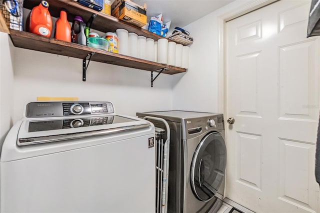 18013 Palm Breeze Dr, Tampa, FL 33647 - washroom with separate washer and dryer and laundry area