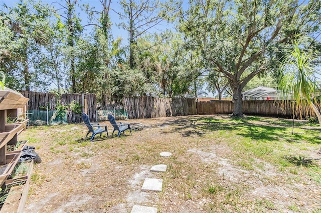 18013 Palm Breeze Dr, Tampa, FL 33647 - view of yard with a fenced backyard