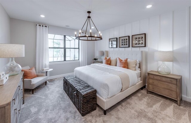 bedroom featuring recessed lighting, baseboards, a notable chandelier, and light carpet