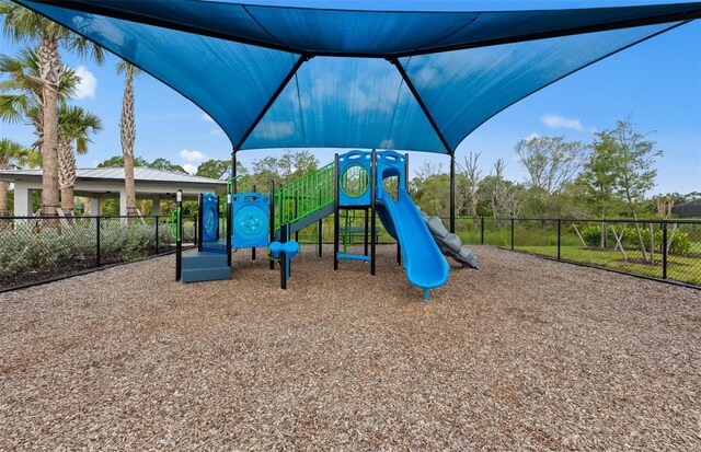 community jungle gym with fence