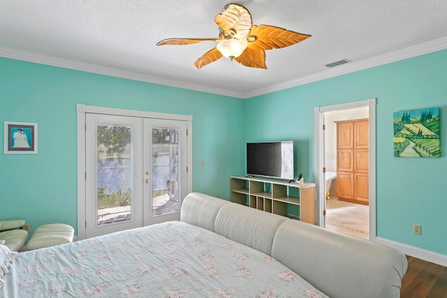 bedroom with french doors, ornamental molding, wood finished floors, and access to exterior