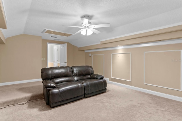 carpeted living room with baseboards, ceiling fan, a textured ceiling, and lofted ceiling