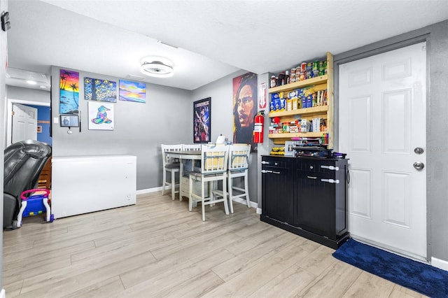 5304 Cherry Ave, Seffner, FL 33584 - recreation room with baseboards and wood finished floors
