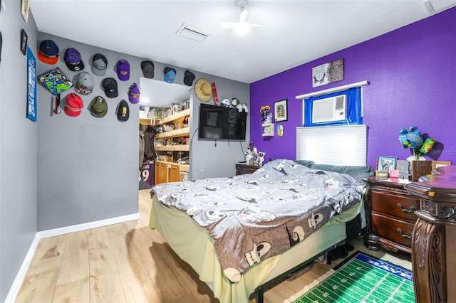 5304 Cherry Ave, Seffner, FL 33584 - bedroom featuring a walk in closet, baseboards, a closet, and visible vents