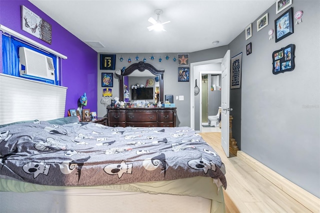 5304 Cherry Ave, Seffner, FL 33584 - bedroom featuring wood finished floors and ensuite bathroom