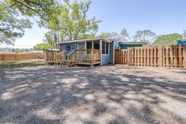 5304 Cherry Ave, Seffner, FL 33584 - view of front of house featuring a deck and fence