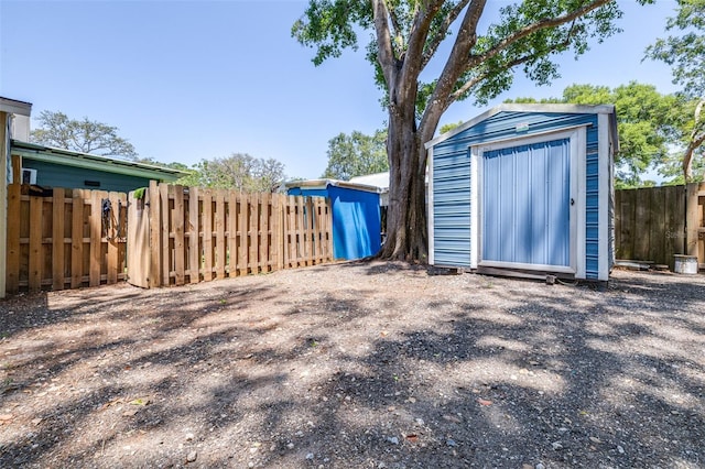 5304 Cherry Ave, Seffner, FL 33584 - view of shed featuring fence