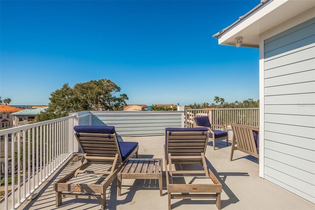 265 Causeway Blvd Unit 7, Dunedin, FL 34698 - view of patio / terrace featuring a balcony