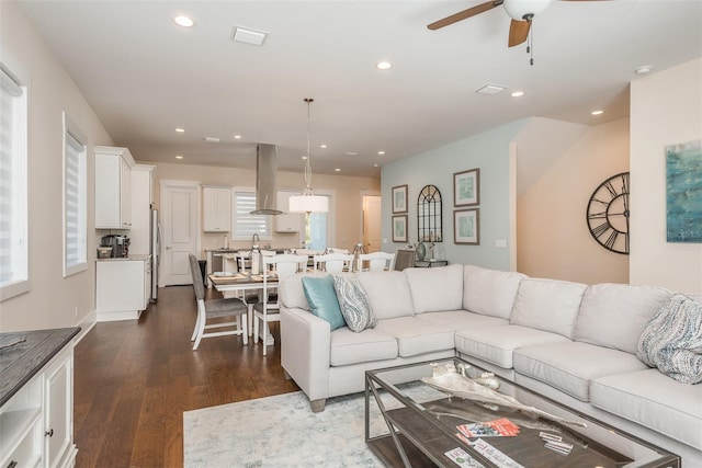 265 Causeway Blvd Unit 7, Dunedin, FL 34698 - living area with dark wood finished floors, a ceiling fan, and recessed lighting
