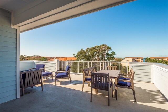 265 Causeway Blvd Unit 7, Dunedin, FL 34698 - view of patio / terrace with outdoor dining area