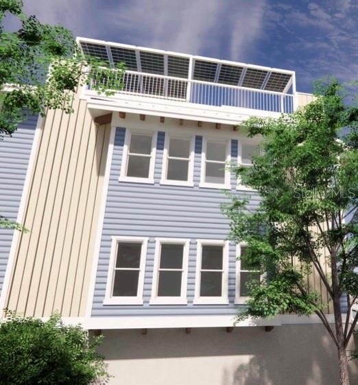 265 Causeway Blvd Unit 7, Dunedin, FL 34698 - view of side of property with a balcony