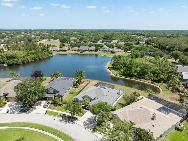 birds eye view of property with a water view and a residential view