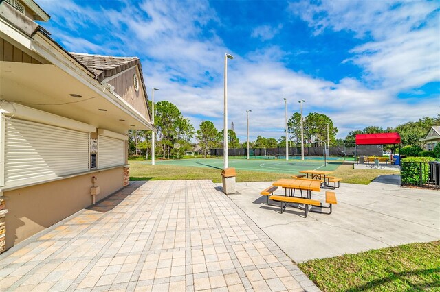 exterior space featuring community basketball court
