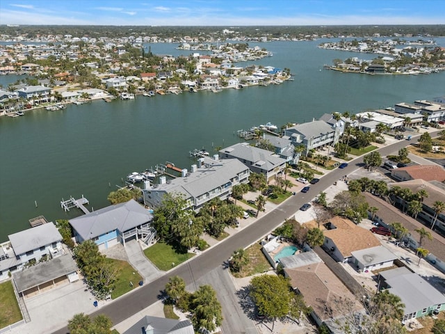 aerial view with a water view and a residential view