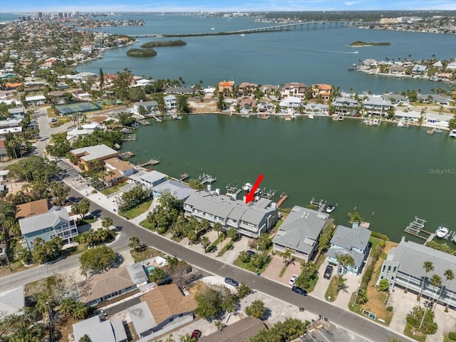 aerial view with a water view and a residential view