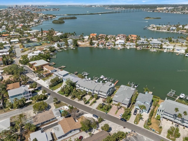 birds eye view of property featuring a residential view and a water view
