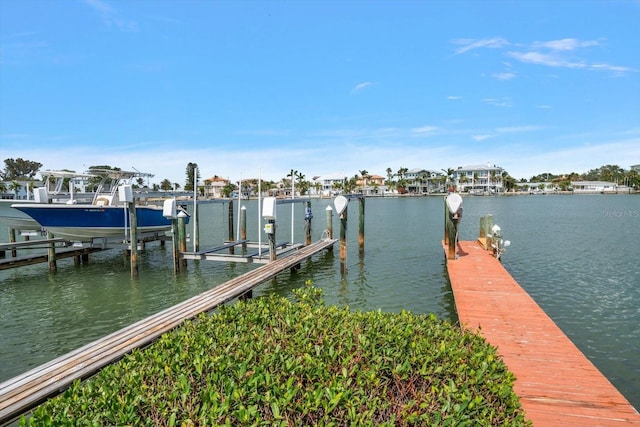 view of dock with a water view and boat lift