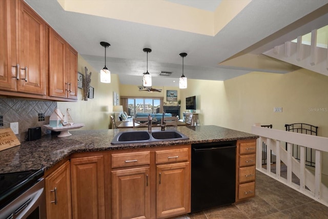 kitchen with a sink, decorative backsplash, brown cabinets, and dishwasher